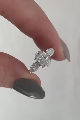 3.30 Carat Three Stone Oval Diamond Engagement Ring With Pear Diamond side Diamonds *** By Chelsea Leigh and Company